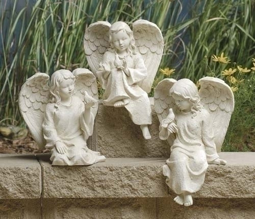 Ivory Stone Cherub with Bird