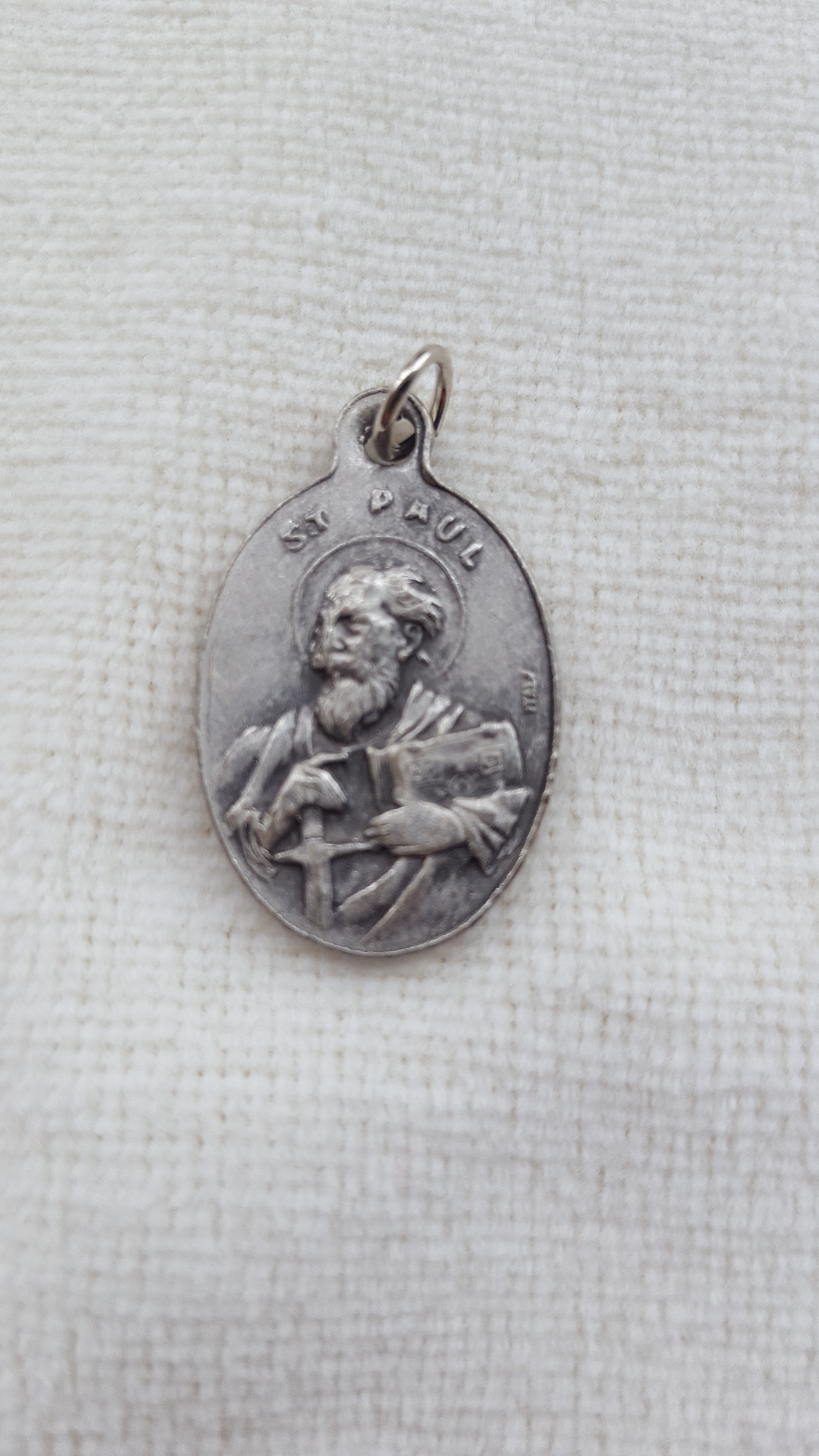 Medalla oxidada de San Pedro/Pablo